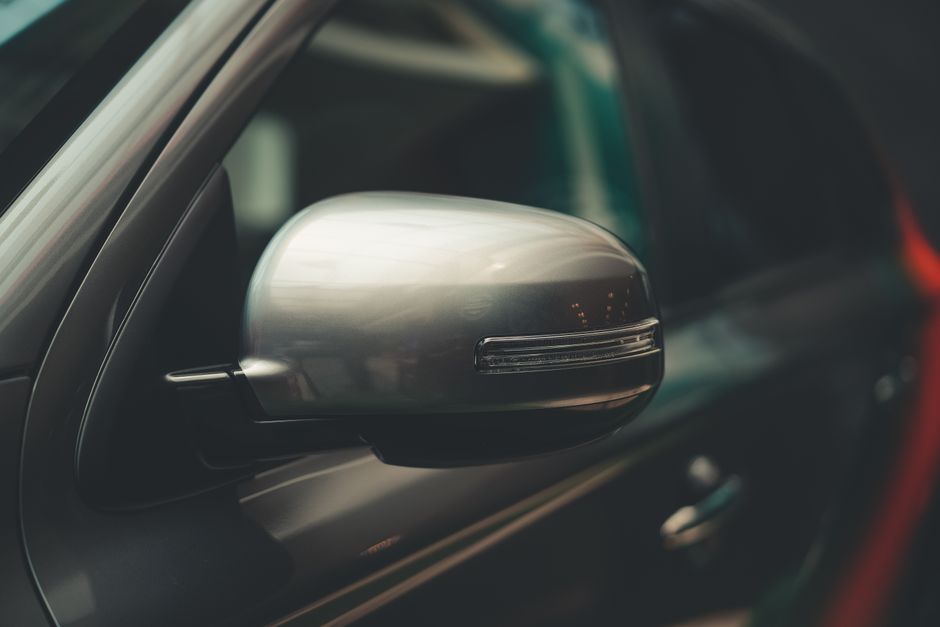 Shiny luxury car exterior after professional ceramic coating